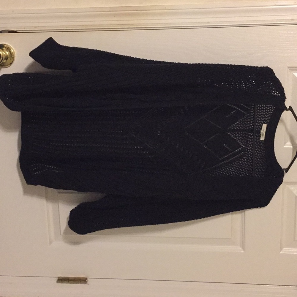 Maurice’s black cardigan